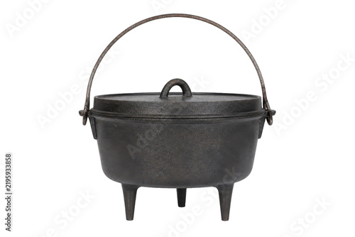 фотографія Rustic black cast iron Dutch oven with a lid and three legs, featuring a sturdy
