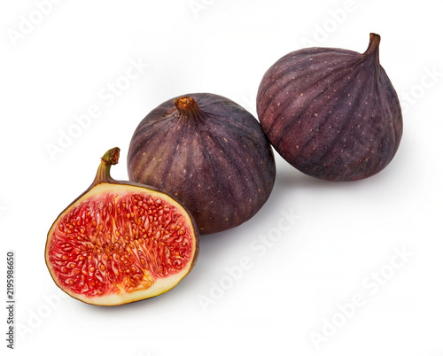 Whole and sliced figs arranged on white background
