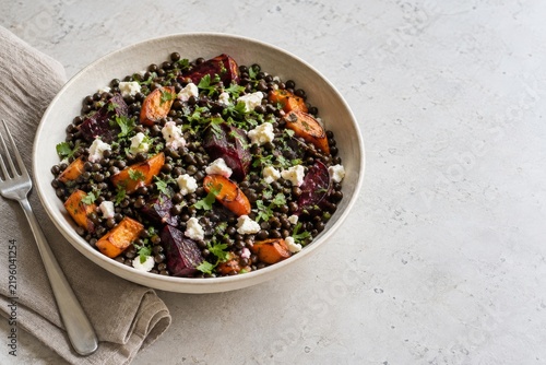 Black lentil salad with roasted vegetables and feta