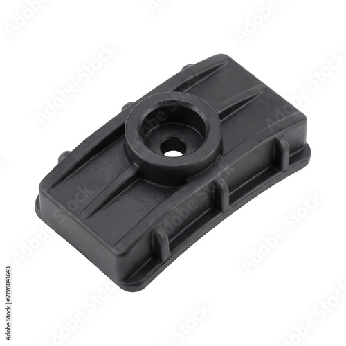 Rectangular black plastic industrial mounting bracket featuring a central circular hole isolated against a clean white professional studio photography background