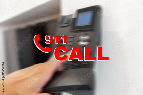 Obraz na płótnie Making a 911 call for emergency assistance in a critical situation