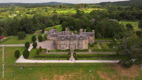 Muckross House in County Kerry, Ireland. Aerial View of the Historic Abbey located between two lakes of Killarney.