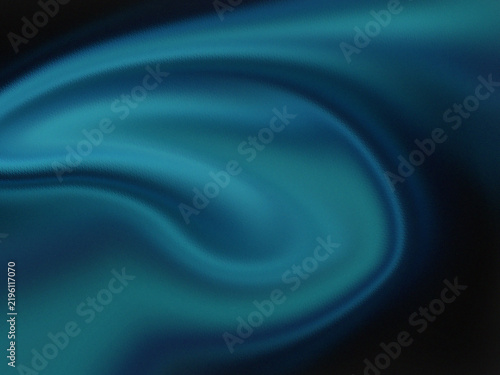 Elegant teal silk fabric displays a beautiful flowing texture with soft curves against a dark shadowed backdrop