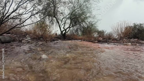 Low Angle View Of Monsoon Rain Storm Water Flowing In Arizona Phoenix Area 