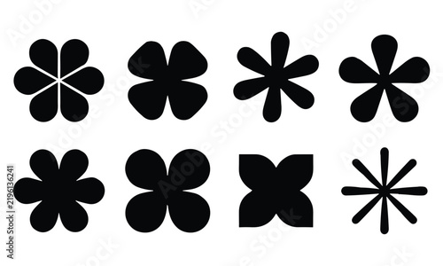 Minimalist collection of eight black flower and floral silhouettes isolated on a bright white background for graphic design.