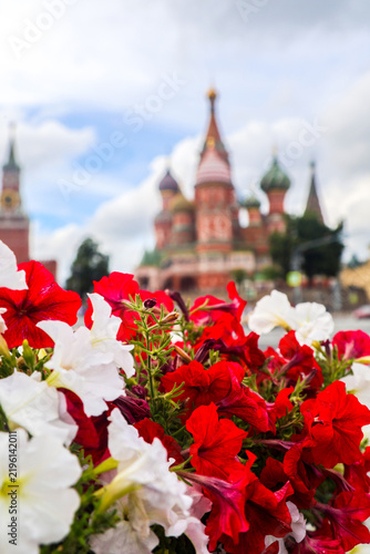 Photography View of the Moscow Kremlin towers and colorful flowerbeds bloom