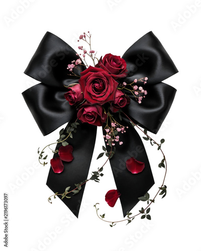 Deep red rose bouquet arrangement with black satin ribbon bow and ivy vines on a transparent background isolated on a transparent background
