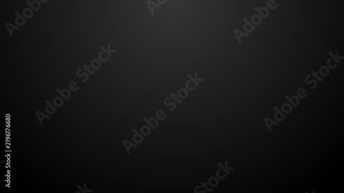 Abstract dark background featuring a gentle radial light effect and subtle texture for designs.