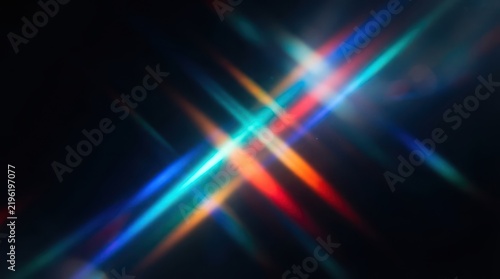 Abstract colorful light streaks on dark background