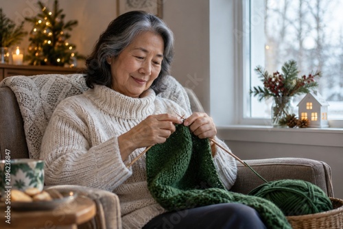 Older woman knitting a scarf during a quiet holiday afternoon