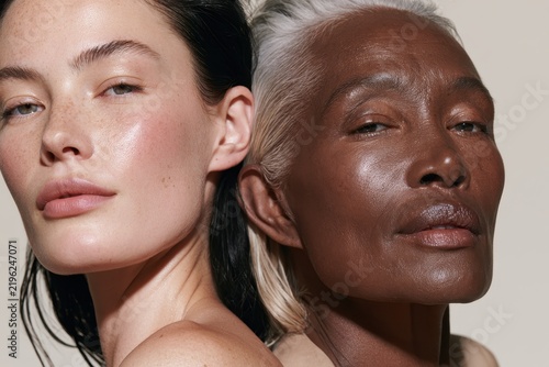 Back-to-back portraits of a young woman and an older woman with smooth skin and natural makeup