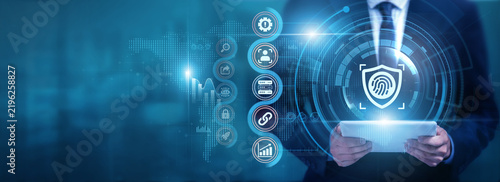 Businessman using tablet analyzing Biometric security and identity data, monitoring authentication systems, protecting digital access, improving user verification and network security