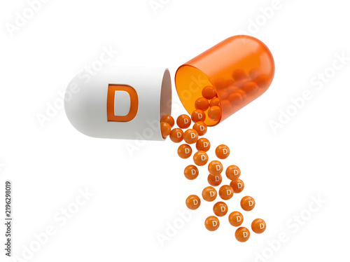 Vitamin d capsule with small pills isolated on transparent background