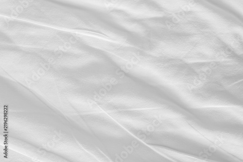 Close up white wrinkled fabric texture rippled surface, Soft focus.