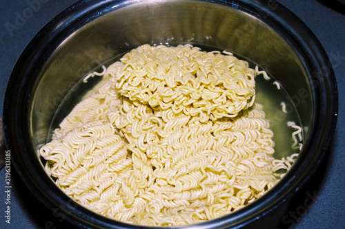Instant noodles soaking in hot water