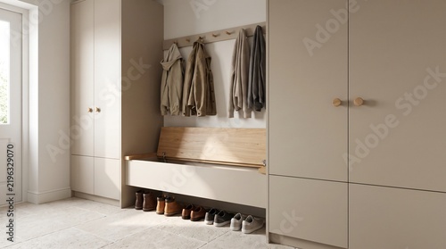 Modern minimalist hallway interior design with beige built in wardrobes and wooden storage bench for shoes and coats in a bright house