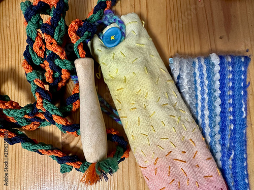 Handmade Waldorf Inspired Embroidered Pencil Case Pouch with Strap on Wooden Background

