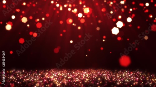 Red and gold particle wave animation with magical light rays for luxury stage background.