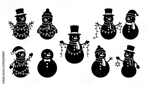 Black snowman silhouettes with Christmas lights, winter holiday
