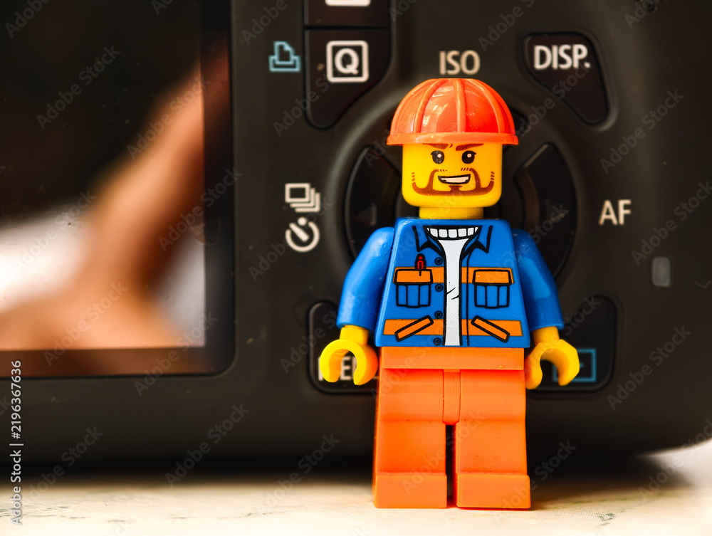 Obraz premium Russia, St. Petersburg, August 8, 2020 A close up shot of a Lego man posing in front of a camera, a playful and creative scene
