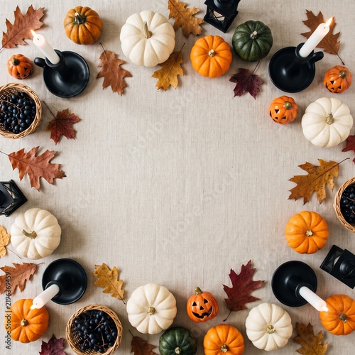Halloween Flat Lay Background with Pumpkins and Autumn Decorations