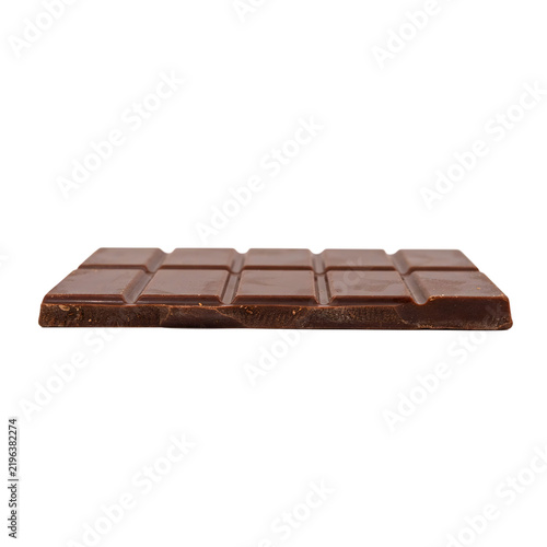 A rectangular bar of milk chocolate with segmented squares, showing a smooth, glossy surface, isolated on a white background, side angle view