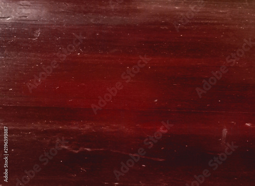 Картината върху платно Dark crimson wood plank texture with deep red undertones offers moody atmospheric background for rustic interior design and high quality carpentry visualization