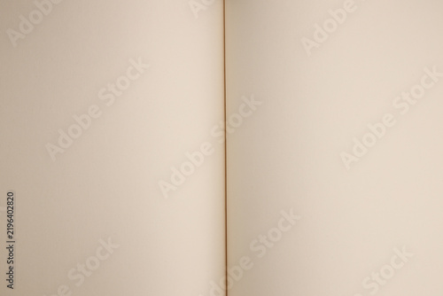 Принти на полотні Open blank cream paper notebook with empty pages and central binding