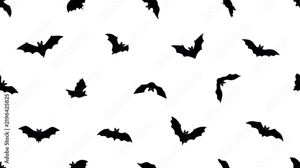 Fototapeta premium Black bat silhouettes create a repeating pattern on a white background