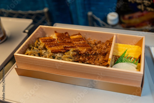 Фотография Shinkansen ekiben Fukagawa-meshi featuring grilled anago conger eel over rice with asari clams, gobo and tamagoyaki sweet egg omelet