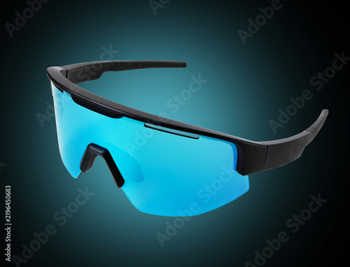 Sports glasses for extreme sports with blue lenses close up on a black background