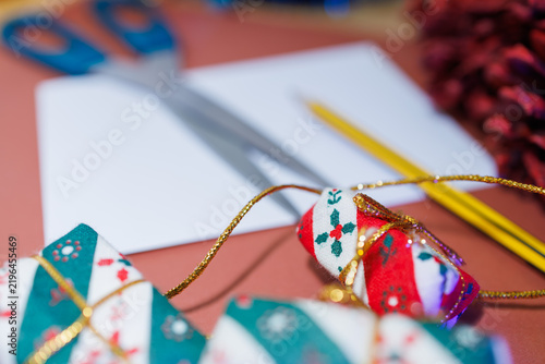 Christmas gift wrapping supplies with handmade decorations