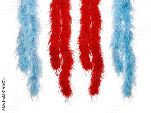 Four colorful feather boas hanging isolated on transparent background
