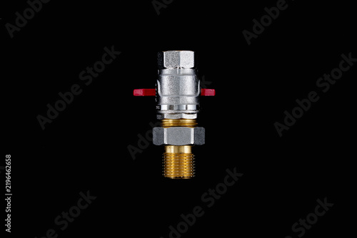 High resolution 60 megapixel macro photograph of a metal ball valve fitting isolated on black background.