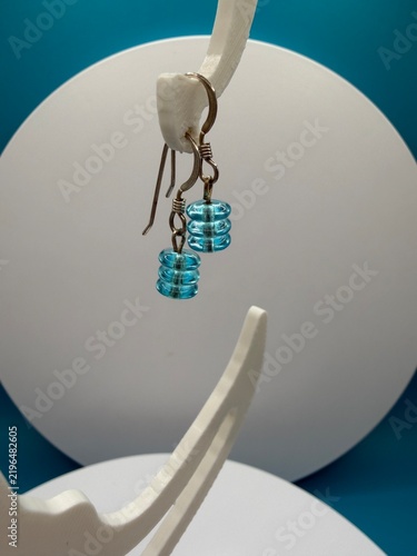 Obraz na płótnie Handmade turquoise glass bead earrings in gift box, blue wire-wrapped dangle jew