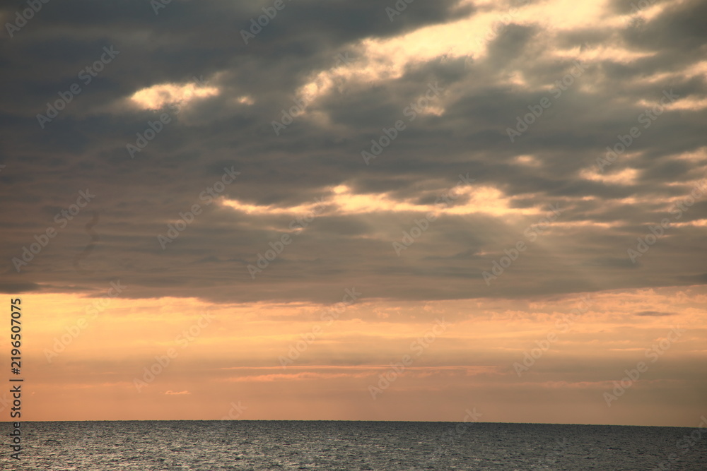Fototapeta premium Golden Evening Sky Over the Sea of Japan, Niigata, Japan
