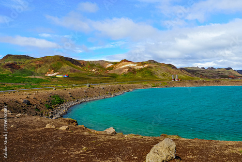 Gígvatnsvatn or Graenesvatn, crater known as the Green Lake in the Reykjanes Peninsula of Iceland. The lake is surrounded by lava fields, mountains and colorful houses.