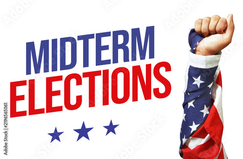 Raised fist wrapped in American flag next to midterm elections text on transparent background