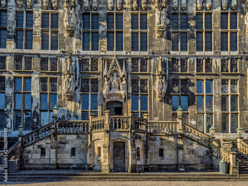 Aachen, Germany, Europe - July 29, 2026: Rathaus, the north facade of the City Hall. Central trio statue is called Christ in Majesty. He sits in the middle. Left: Pope Leo III. Right: Charlemagne. Tha