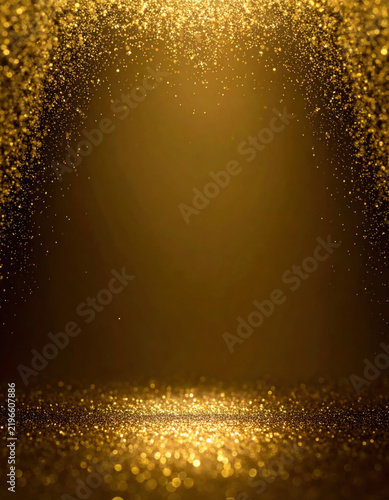 Golden glitter particle background with glowing light, dark center, and sparkling floor creating elegant festive atmosphere