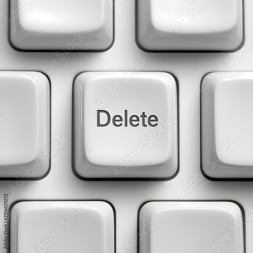 Close-up of a Keyboard Key with the Word Delete on Its Surface