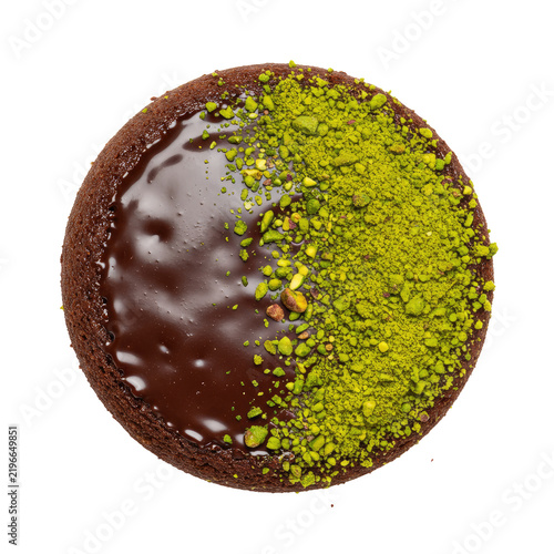 Circular Chocolate Cake Topped With Chocolate Glaze And Green Pistachios Against Transparent Background