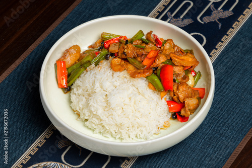 Stir-fried Pork Rice Bowl. Chinese Homestyle Spicy Pork Dish Close-up