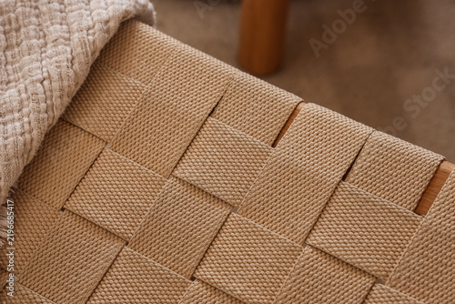 Quadro su tela Minimalist interior design and home comfort, woven cord chair seat with soft tex