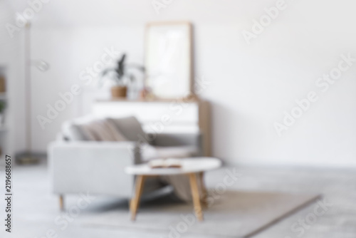 Interior design and home staging, blurred modern living room with comfortable...
