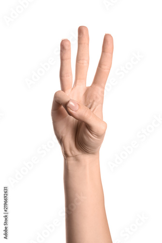 Konstfotografi Communication and counting gesture, woman hand showing three fingers up for numb