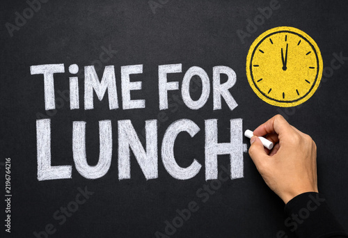 Hand Writing Time for Lunch Message on Chalkboard with Clock Illustration