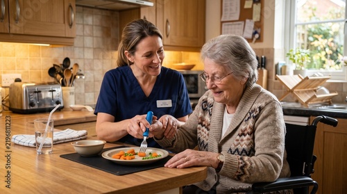 A dedicated caregiver assisting an elderly woman with her meal in a home kitchen setting.