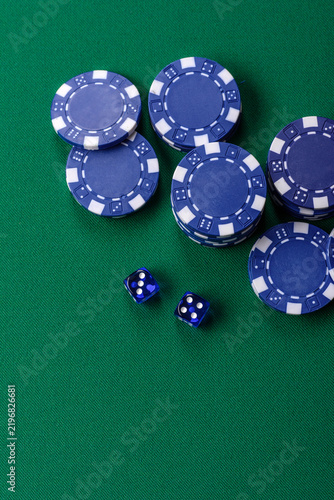 Multicolored casino chips as a conceptual backdrop for gambling games like poker, blackjack
