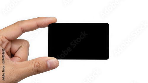 Hand holding black smartphone with white background